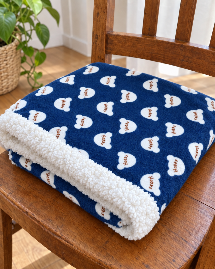 Plaid Câlin Bordure Sherpa – coloris Bleu